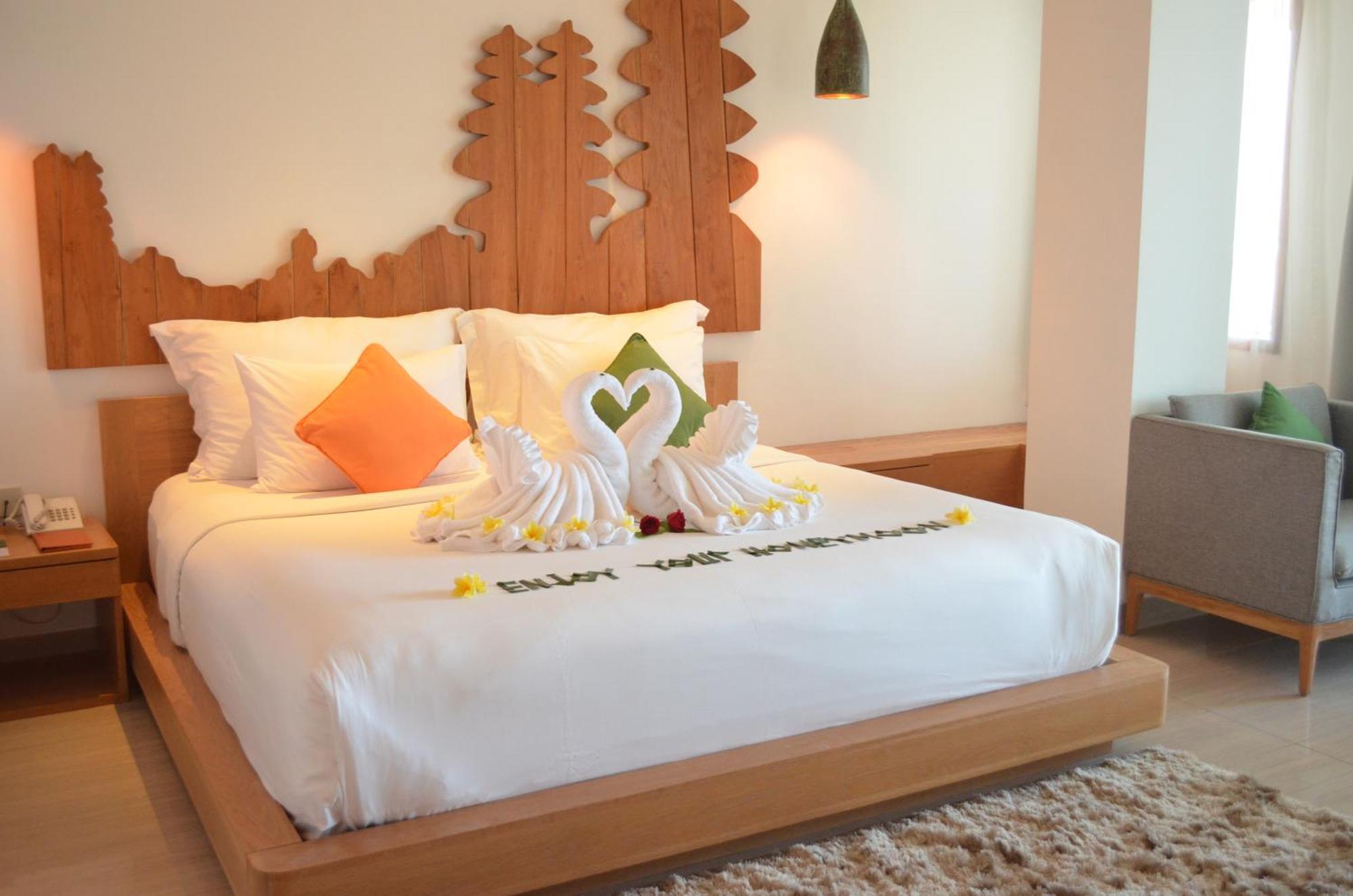 Hotel Nikko Bali Benoa Beach Nusa Dua (Bali) Exterior foto A bed with a towel art